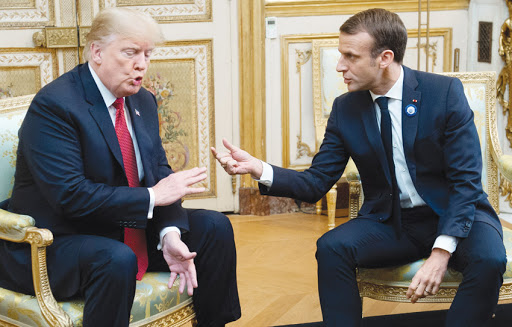  بولتون يكشف وصف ترامب للرئيس الفرنسي! 