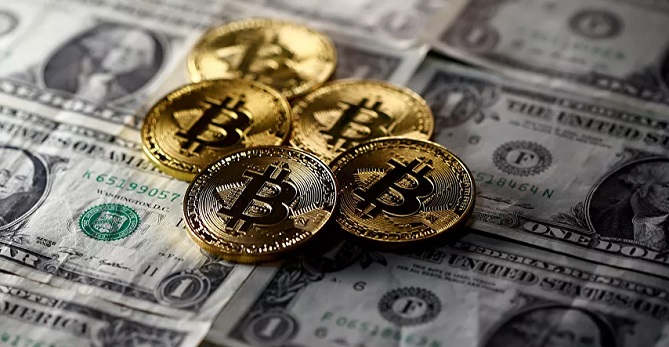 قيمة عملة "البيتكوين" تتجاوز مستوى 57 ألف دولار